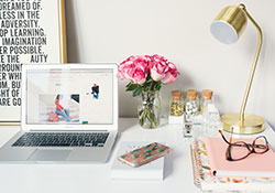 Creative workspace with beautiful flowers