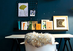 Creative desk with frames and pictures